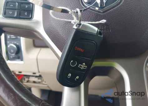 2015 Ram 1500 Laramie z USA, uszkodzony, nr VIN 1C6RR7NT3FS638093